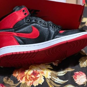 Jordan 1’s Women’s size 7. Retro satin red, and white